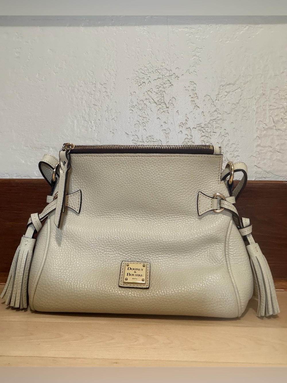Dooney & Bourke Ivory Pebbled Leather Shoulder Bag with Tassels